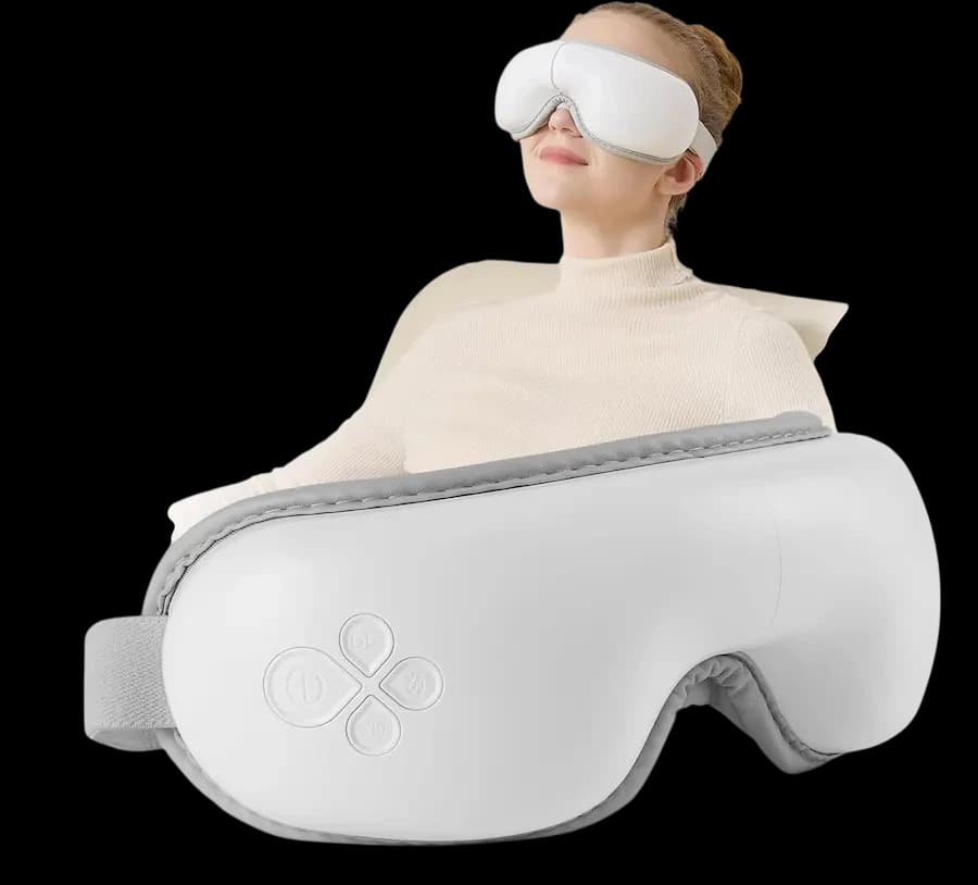 Heated eye massager